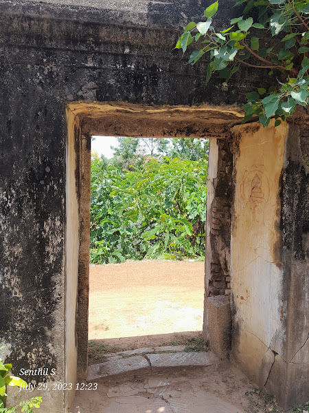 Temple corridor with oil lamps
