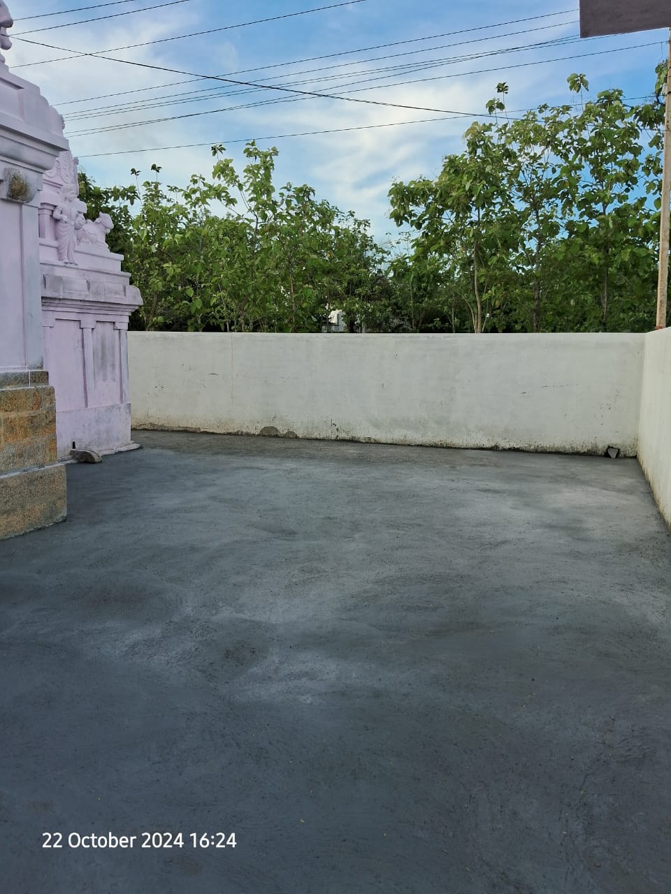 Devotional setup with diyas and garlands